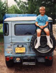 Get full size image - my Land Cruiser in its original look (with my younger brother on the spare) before body work and paint